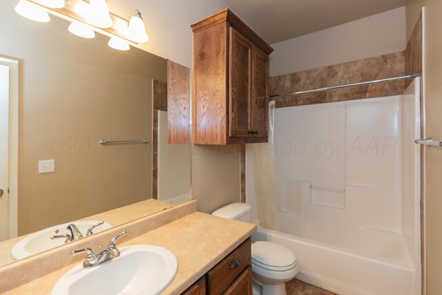 3508 Bismarck Ave, Amarillo, TX 79118 - bathroom featuring toilet, vanity, and  shower combination