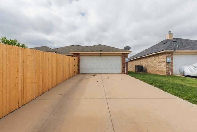 3508 Bismarck Ave, Amarillo, TX 79118 - view of side of property with central AC and brick siding