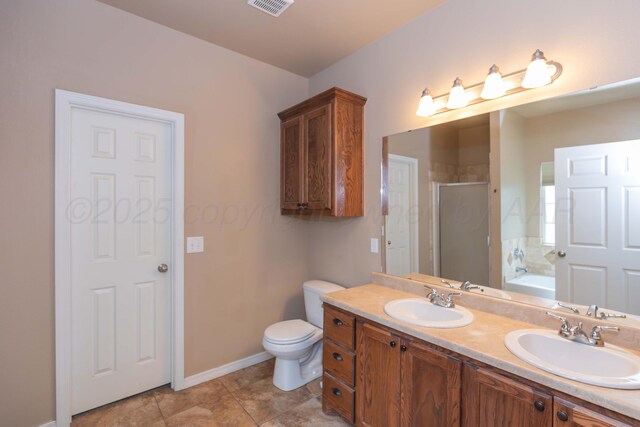 3508 Bismarck Ave, Amarillo, TX 79118 - full bath featuring a shower stall, a garden tub, double vanity, baseboards, and toilet