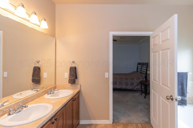3508 Bismarck Ave, Amarillo, TX 79118 - full bath with double vanity, ensuite bathroom, baseboards, and a bath