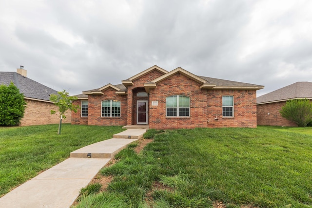 3508 Bismarck Ave, Amarillo, TX 79118 - single story home featuring a front lawn and brick siding