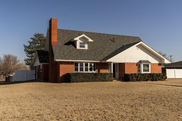 view of front of home with a front yard