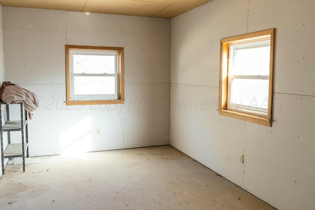 unfurnished room with plenty of natural light