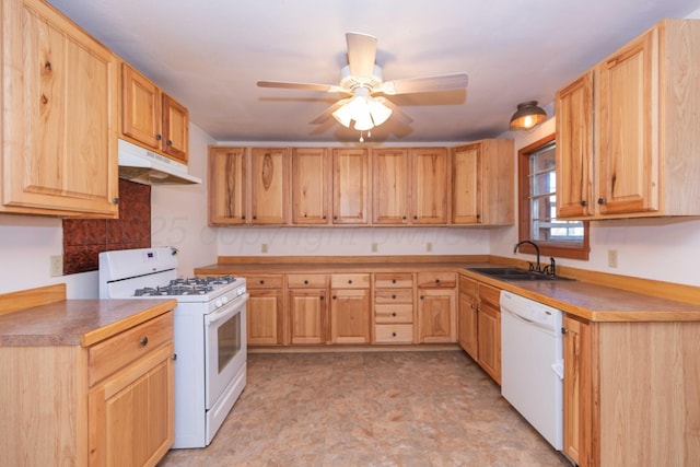 kitchen with white appliances, a sink, a ceiling fan, and under cabinet range hood