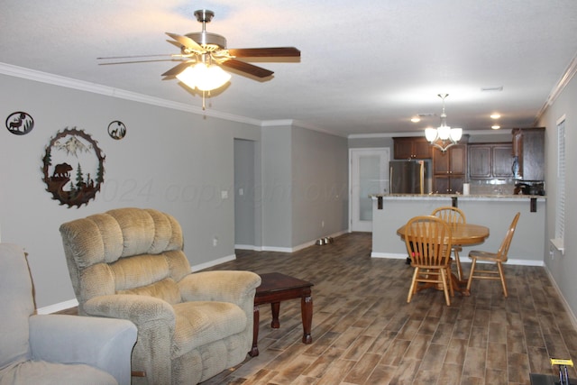 dining area featuring ornamental molding, ceiling fan with notable chandelier, and dark hardwood / wood-style flooring