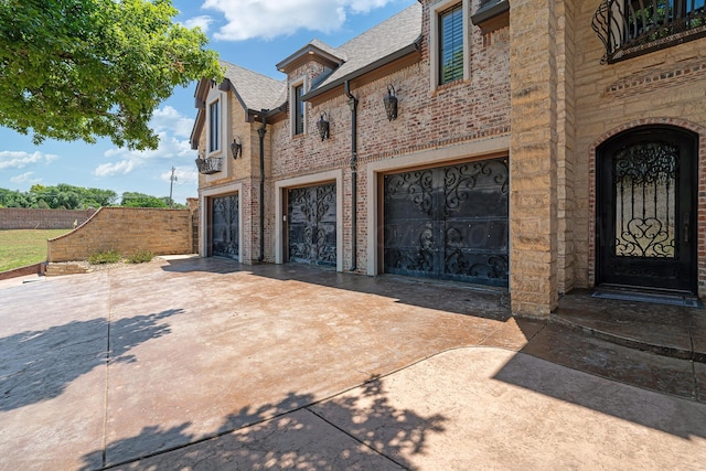 4 Kingsridge Pl, Amarillo, TX 79106 - view of property with concrete driveway and an attached garage