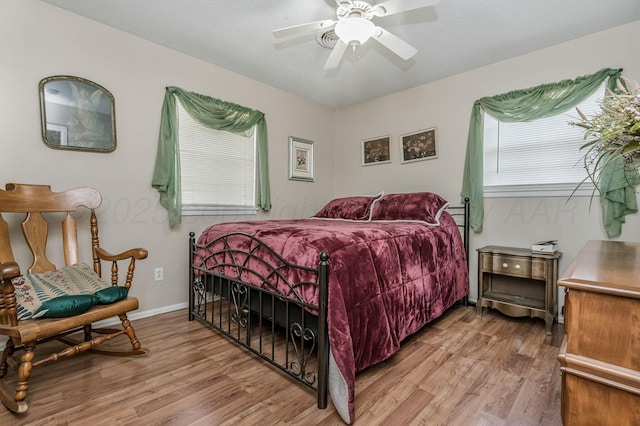 5222 S Travis St, Amarillo, TX 79110 - bedroom featuring wood finished floors and a ceiling fan
