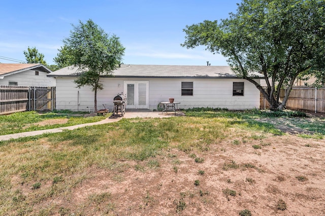 5222 S Travis St, Amarillo, TX 79110 - rear view of property featuring a fenced backyard and a patio area