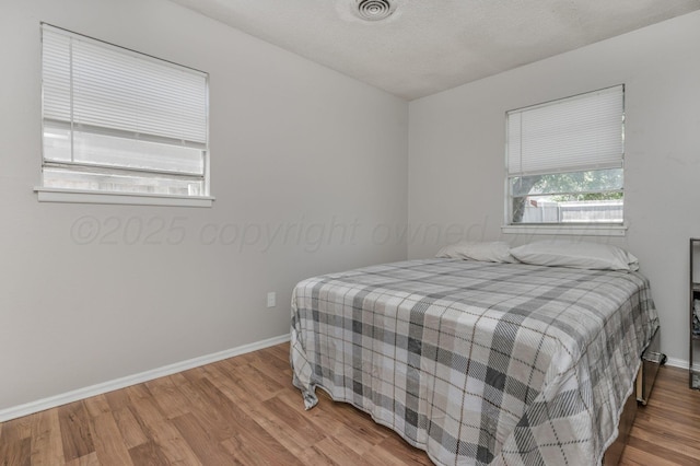 5222 S Travis St, Amarillo, TX 79110 - bedroom featuring wood finished floors