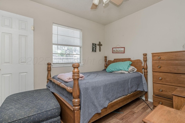 5222 S Travis St, Amarillo, TX 79110 - bedroom with wood finished floors and ceiling fan