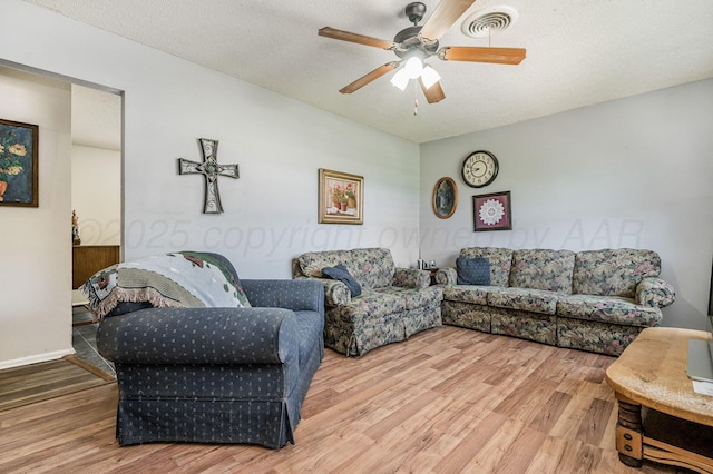 5222 S Travis St, Amarillo, TX 79110 - living area with wood finished floors and a ceiling fan