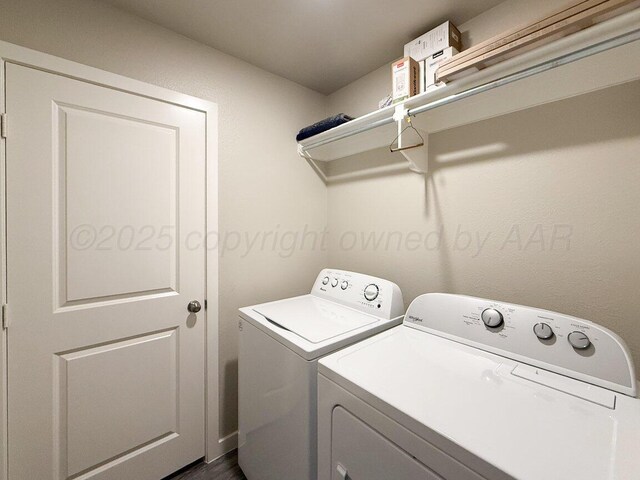 5012 Locker St, Amarillo, TX 79118 - laundry room featuring washer and dryer and dark wood-type flooring