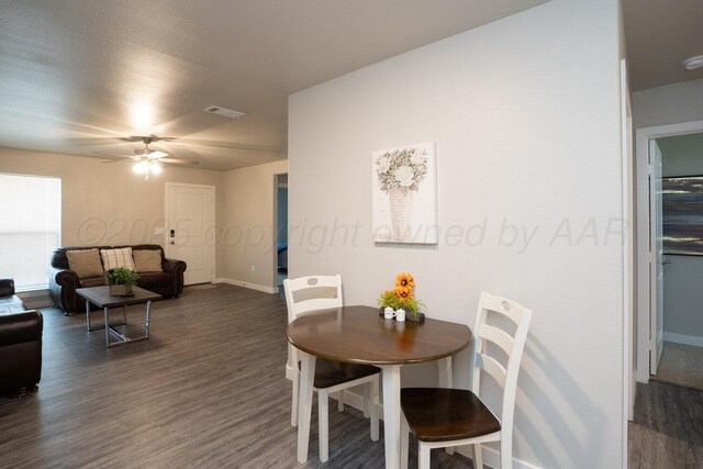 5012 Locker St, Amarillo, TX 79118 - dining area featuring ceiling fan and dark wood-style flooring
