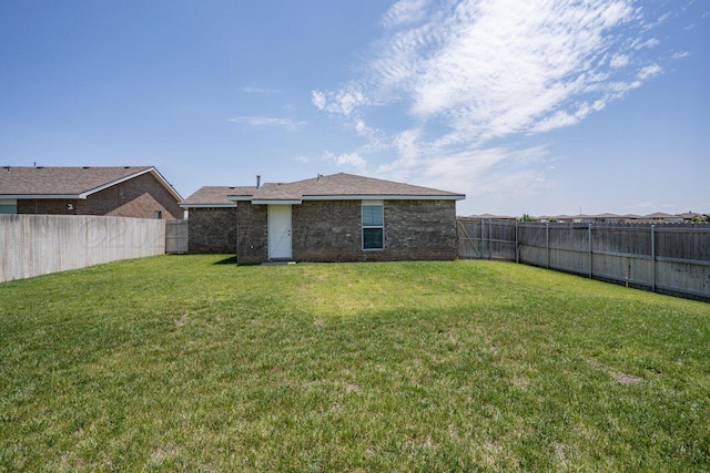 5012 Locker St, Amarillo, TX 79118 - rear view of property with a fenced backyard and brick siding