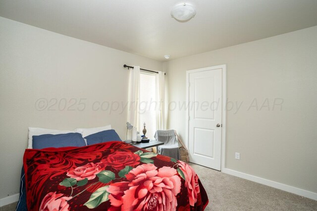 5012 Locker St, Amarillo, TX 79118 - carpeted bedroom featuring baseboards