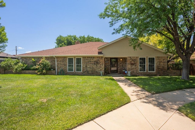 5105 Black Oak Dr, Amarillo, TX 79110 - single story home featuring a front lawn, brick siding, and a chimney
