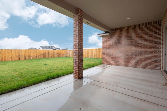 view of patio with a fenced backyard