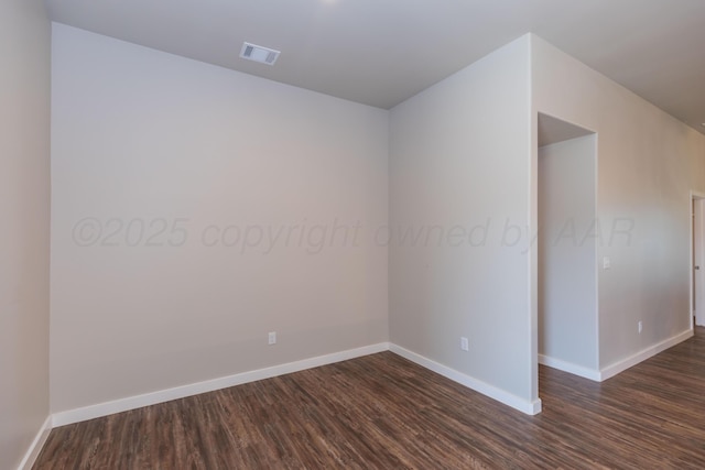7701 Bellamy Dr, Amarillo, TX 79119 - unfurnished room featuring dark wood-style floors and baseboards