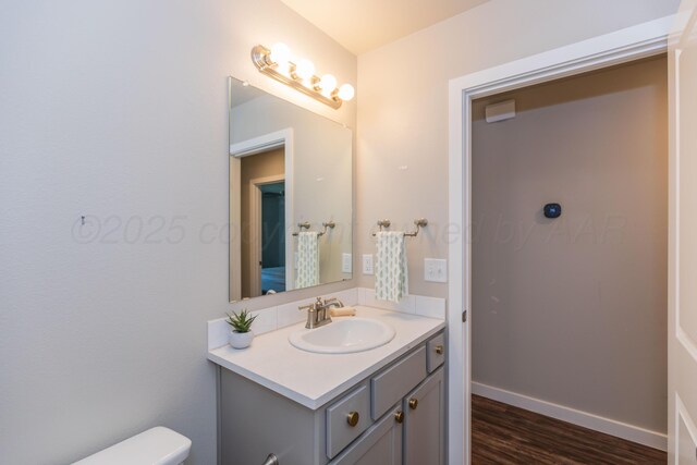 7701 Bellamy Dr, Amarillo, TX 79119 - bathroom featuring vanity and wood finished floors