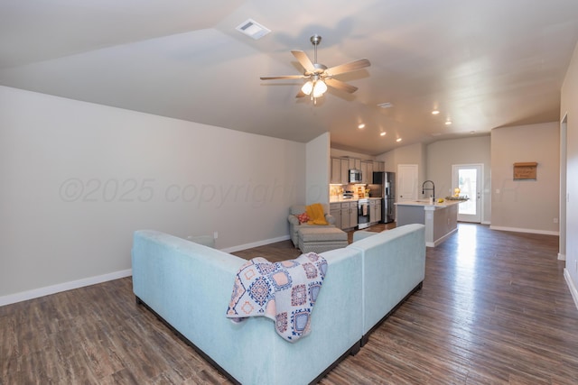 7701 Bellamy Dr, Amarillo, TX 79119 - living room featuring lofted ceiling, ceiling fan, dark wood-type flooring, and recessed lighting