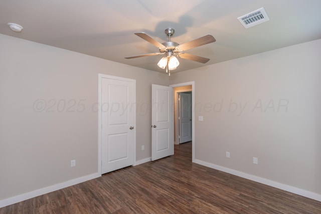 7701 Bellamy Dr, Amarillo, TX 79119 - spare room with dark wood finished floors, a ceiling fan, and a smoke detector