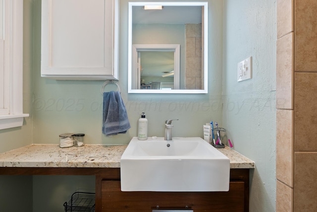 3607 Fleetwood Dr, Amarillo, TX 79109 - bathroom featuring vanity and a textured wall