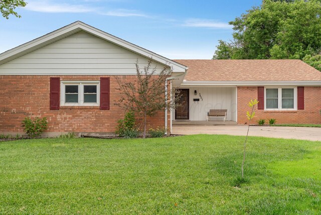 3607 Fleetwood Dr, Amarillo, TX 79109 - single story home featuring a front lawn, brick siding, and a shingled roof