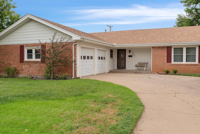 3607 Fleetwood Dr, Amarillo, TX 79109 - single story home featuring brick siding, a garage, concrete driveway, and a front yard