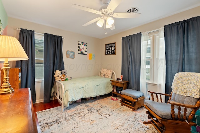 3607 Fleetwood Dr, Amarillo, TX 79109 - bedroom with wood finished floors and ceiling fan
