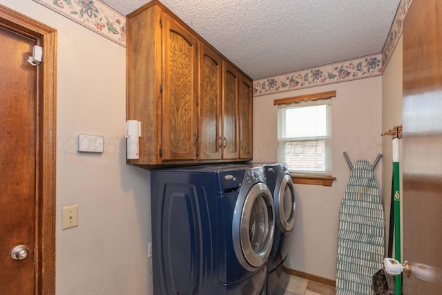 7806 Cervin Dr, Amarillo, TX 79121 - washroom with cabinet space, washer and dryer, a textured ceiling, and baseboards