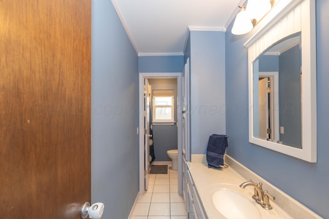7806 Cervin Dr, Amarillo, TX 79121 - bathroom with toilet, crown molding, vanity, and tile patterned floors