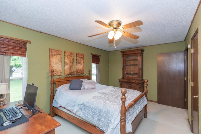 7806 Cervin Dr, Amarillo, TX 79121 - bedroom with light carpet, a textured ceiling, and ceiling fan