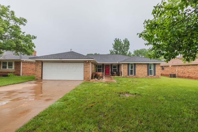 7806 Cervin Dr, Amarillo, TX 79121 - single story home with a garage, a front lawn, brick siding, concrete driveway, and central air condition unit