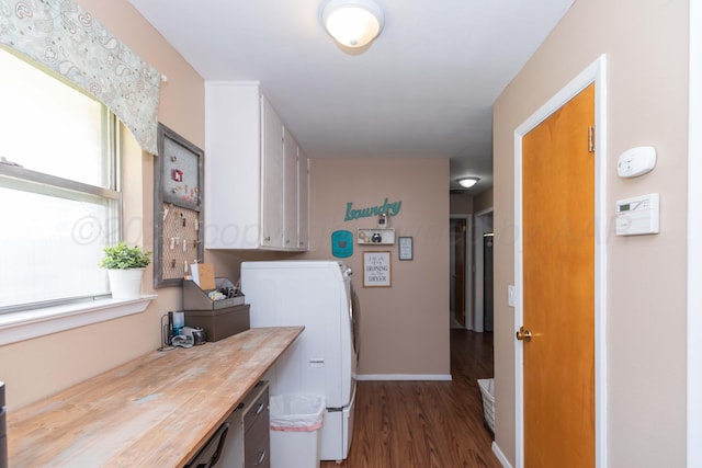 407 Thompson Ln, Canyon, TX 79015 - interior space with cabinet space, washer and clothes dryer, wood finished floors, and baseboards