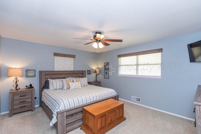 407 Thompson Ln, Canyon, TX 79015 - bedroom featuring light colored carpet, baseboards, ceiling fan, and visible vents