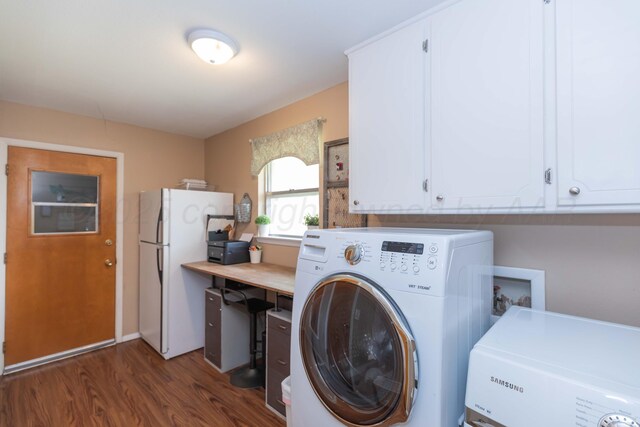 407 Thompson Ln, Canyon, TX 79015 - laundry area featuring independent washer and dryer, cabinet space, and dark wood-type flooring