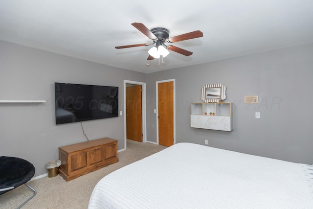 407 Thompson Ln, Canyon, TX 79015 - carpeted bedroom with baseboards and a ceiling fan