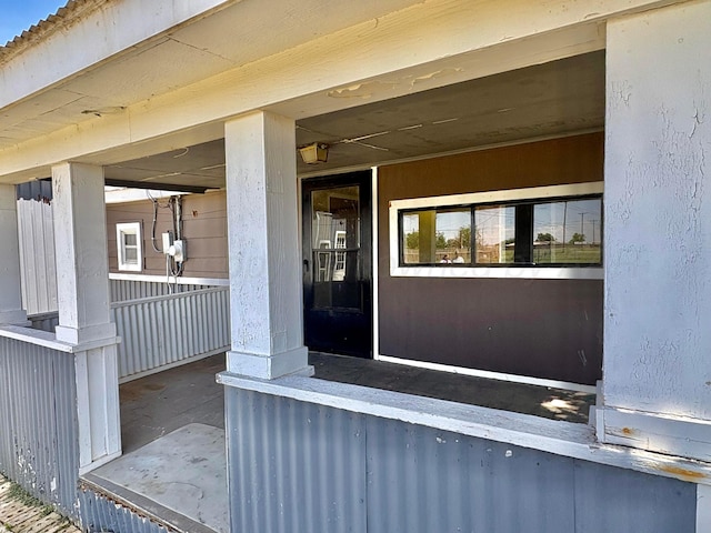 605 E 4th St, Panhandle, TX 79068 - view of exterior entry with covered porch