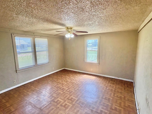 605 E 4th St, Panhandle, TX 79068 - unfurnished room with a ceiling fan, a textured ceiling, and baseboards