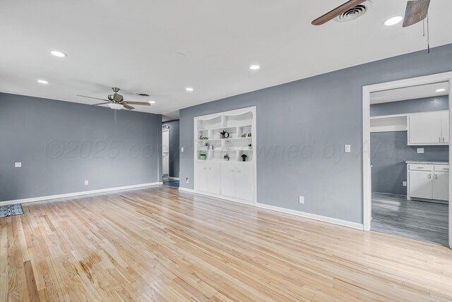 3701 Westlawn Ave, Amarillo, TX 79102 - unfurnished living room featuring a ceiling fan, light wood-type flooring, recessed lighting, and built in features