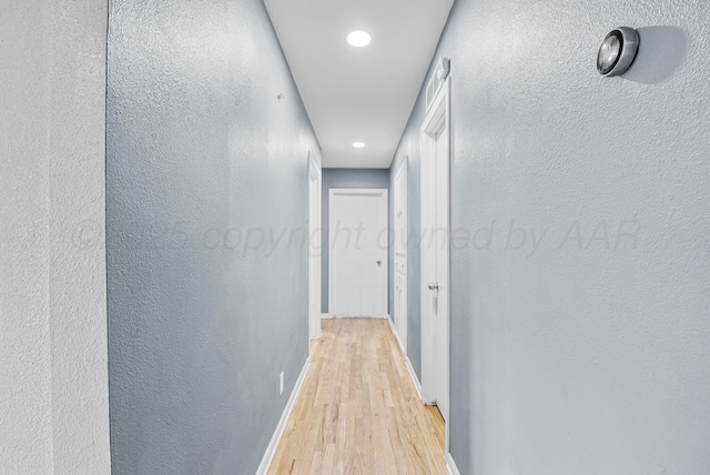3701 Westlawn Ave, Amarillo, TX 79102 - corridor featuring light wood-type flooring, recessed lighting, and a textured wall