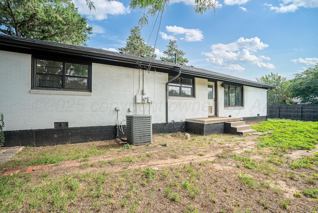3701 Westlawn Ave, Amarillo, TX 79102 - back of property featuring crawl space and brick siding