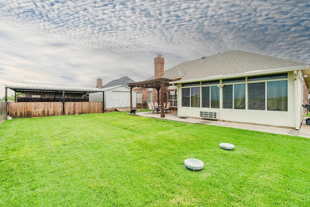 212 Cimarron St, Borger, TX 79007 - rear view of house featuring a patio area, a sunroom, a pergola, roof with shingles, and a chimney