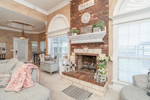 212 Cimarron St, Borger, TX 79007 - living area with healthy amount of natural light, a fireplace, ornamental molding, and carpet