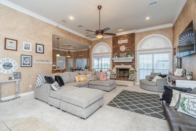 212 Cimarron St, Borger, TX 79007 - living area featuring a ceiling fan, carpet, a stone fireplace, baseboards, and ornamental molding