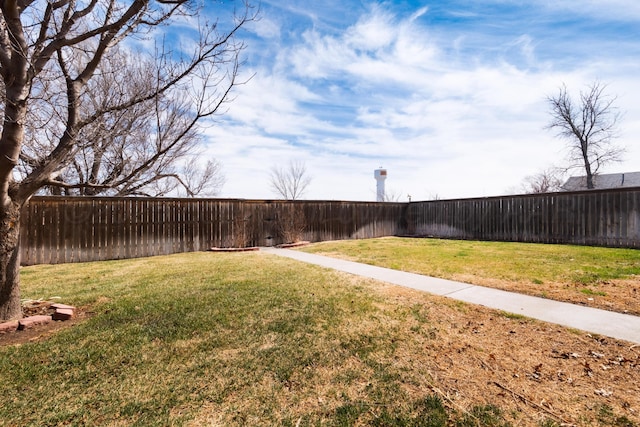 view of yard featuring a fenced backyard