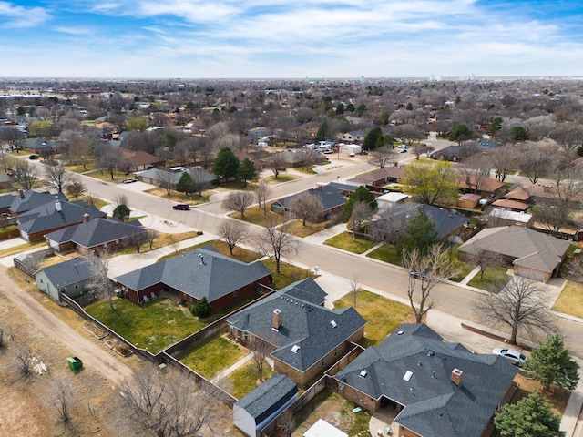 birds eye view of property with a residential view