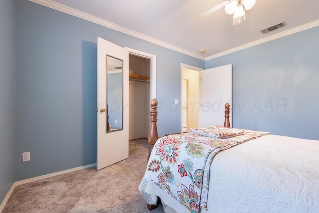 bedroom with visible vents, light carpet, ceiling fan, and crown molding