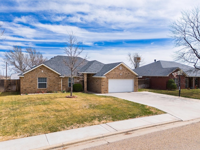 ranch-style home with fence, driveway, a front lawn, a garage, and brick siding