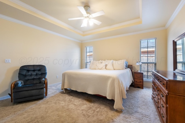 bedroom with light carpet, a raised ceiling, ceiling fan, and crown molding